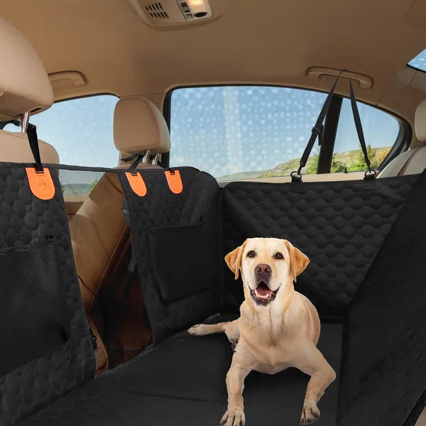 Bench Dog Back Seat Cover installed across a car rear seat with a Labrador lying on it