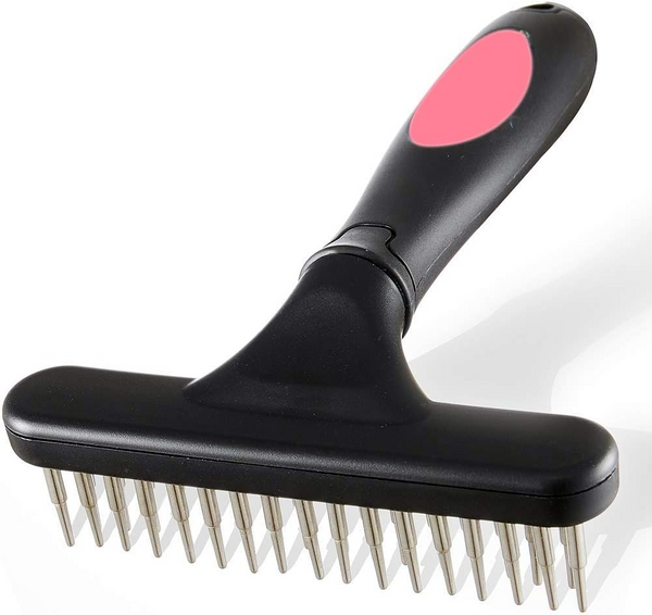 Furrow Undercoat Rake pin brush with black handle and pink grip, angled product shot