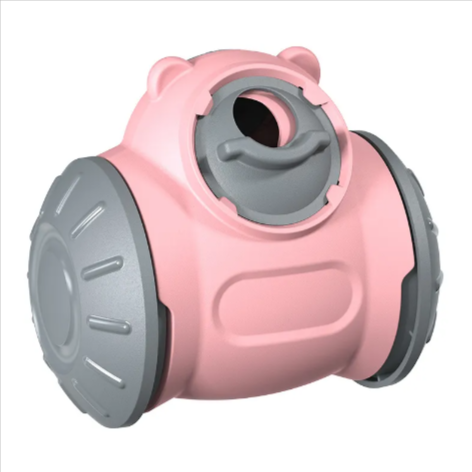 Pink bear-shaped Keel Treat Tumbler with grey rolling ends and a round treat opening