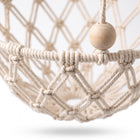 Close-up detail of the Drift Macrame Cat Hammock knotted diamond-weave rope and natural wood bead