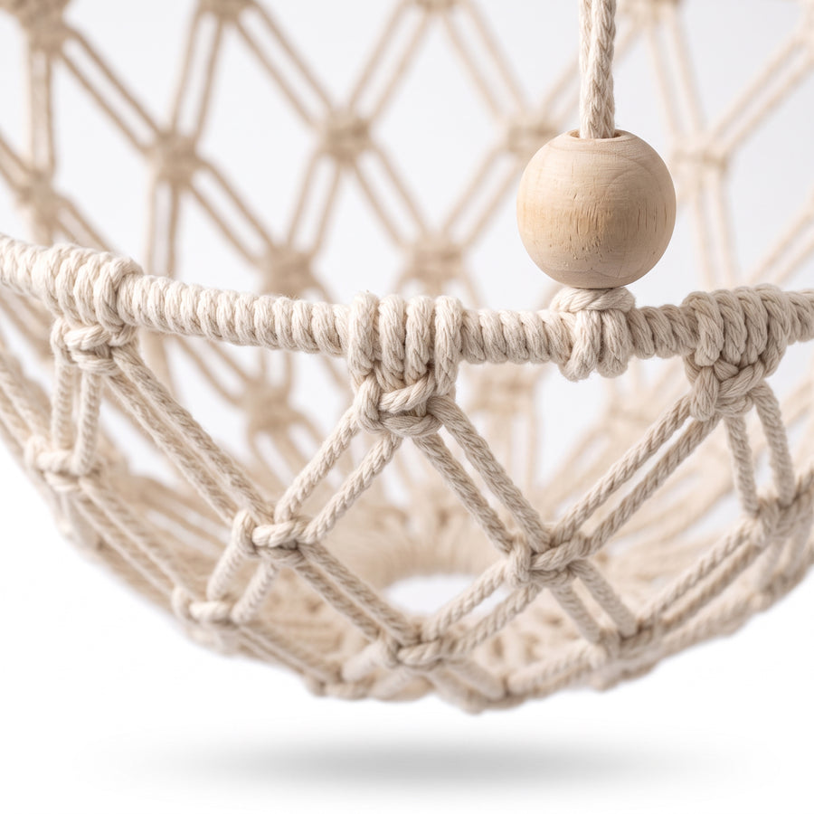 Close-up detail of the Drift Macrame Cat Hammock knotted diamond-weave rope and natural wood bead