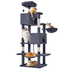 Spire 66-Inch Cat Tree in dark grey with cats on the top perch, basket and hammock